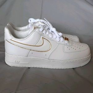 Nike air force 1 metallic gold trim
